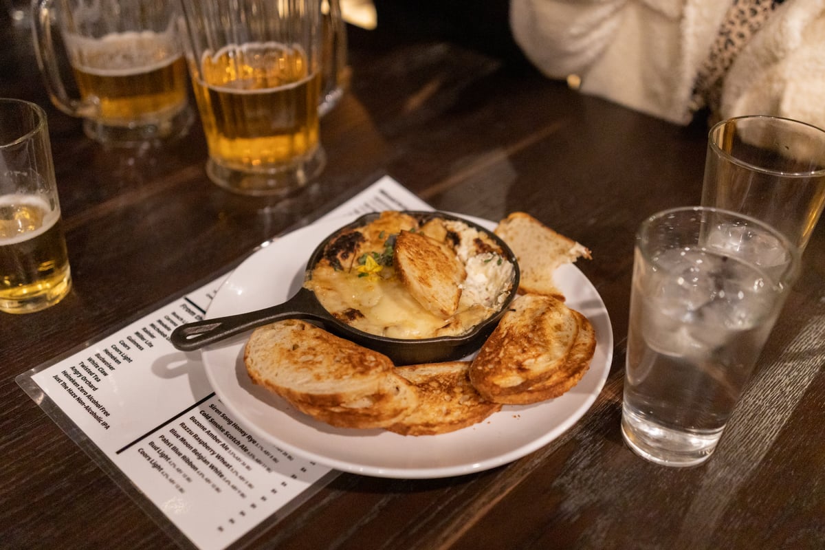 Cheesy dip with bread at The Jump in Bozeman
