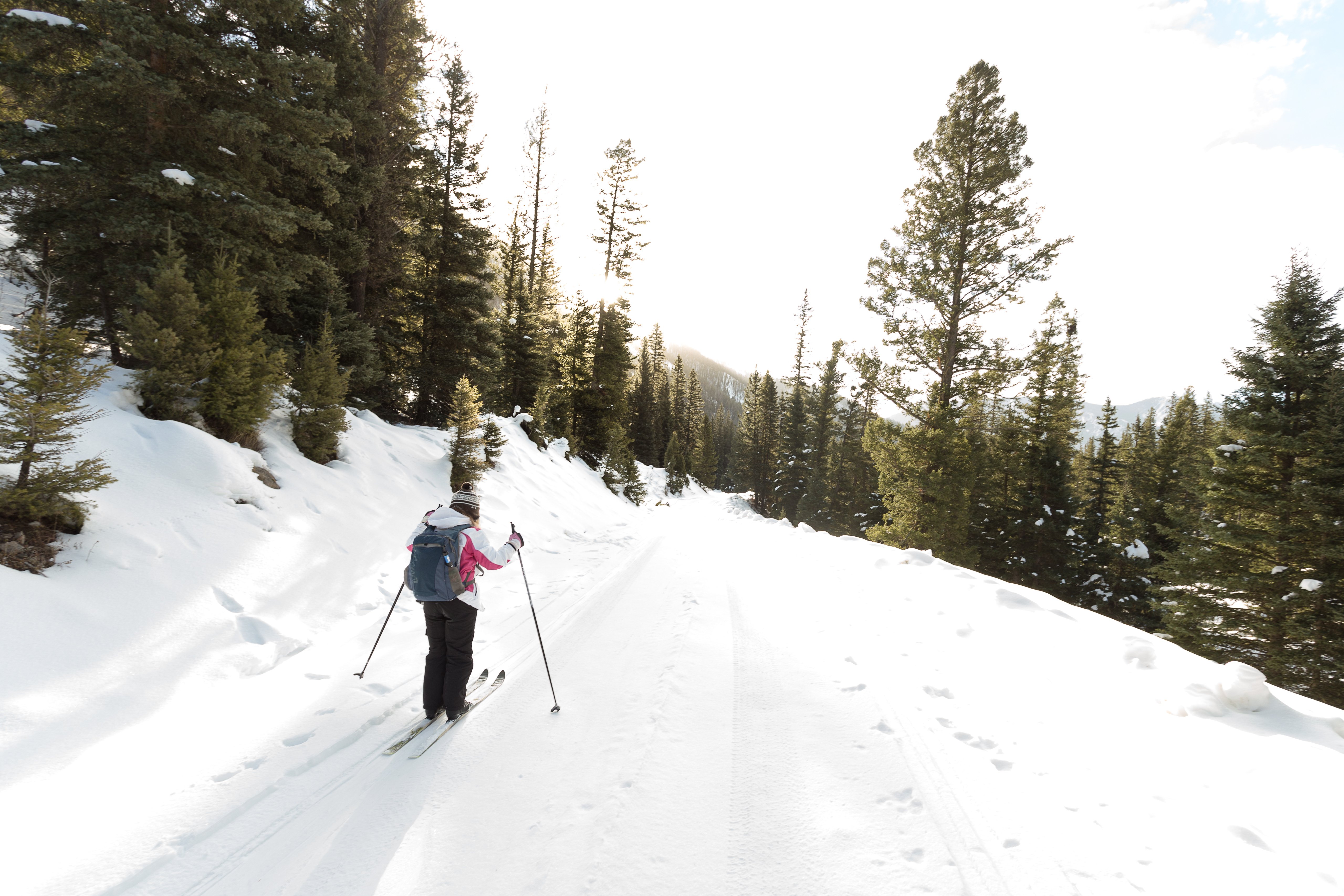Woman backcountry skiing in Montana