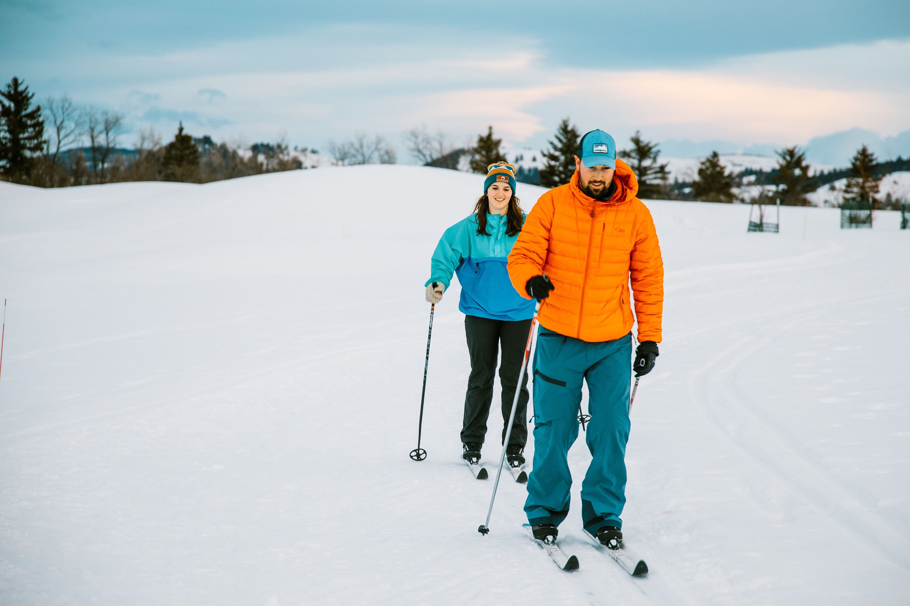A couple trying nordic skiing in Bozeman, Montana