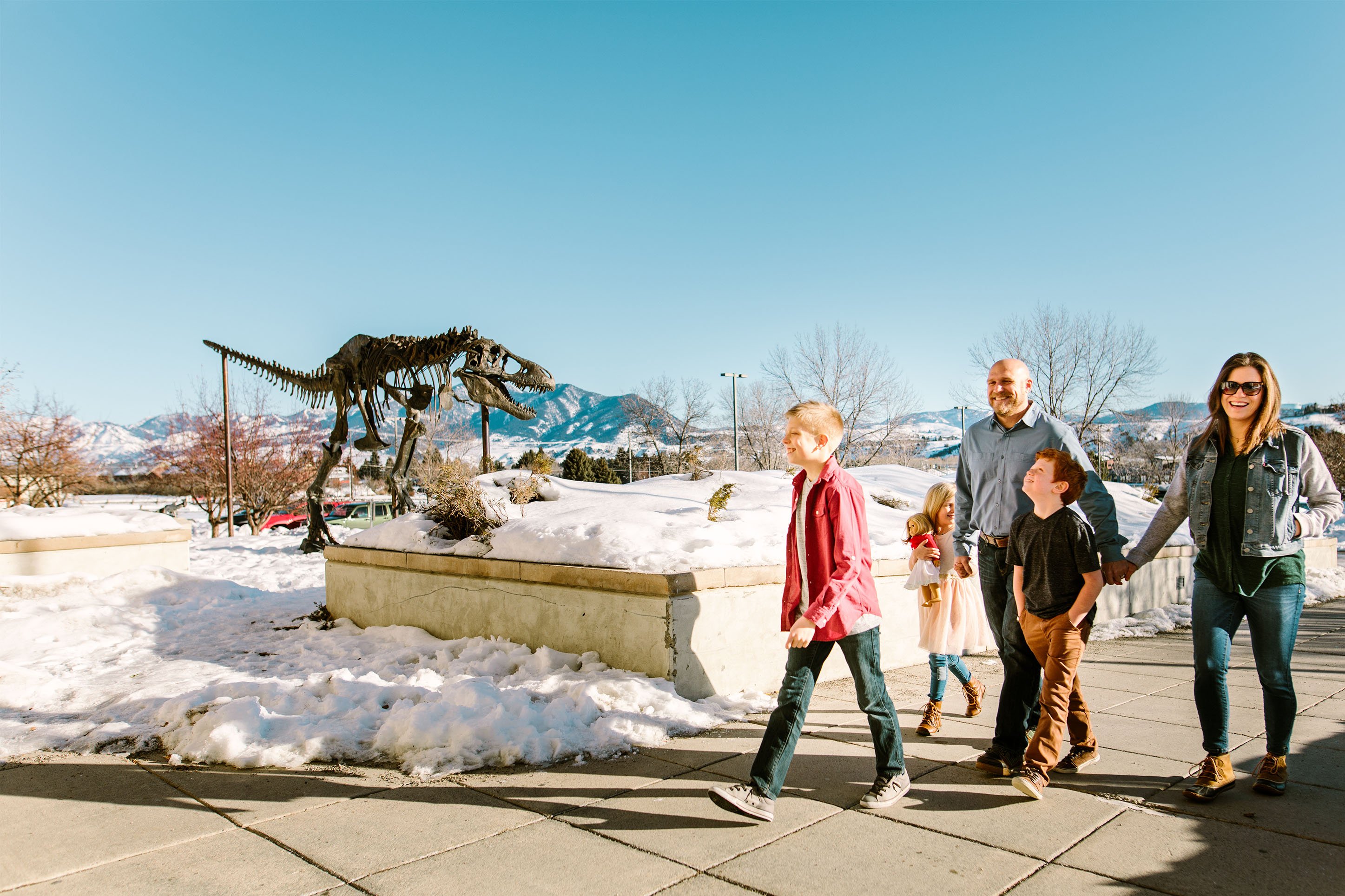 Family walking into Museum of the Rockies