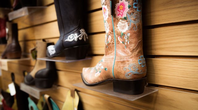 Boots on the wall at Carters Boots and Repair.