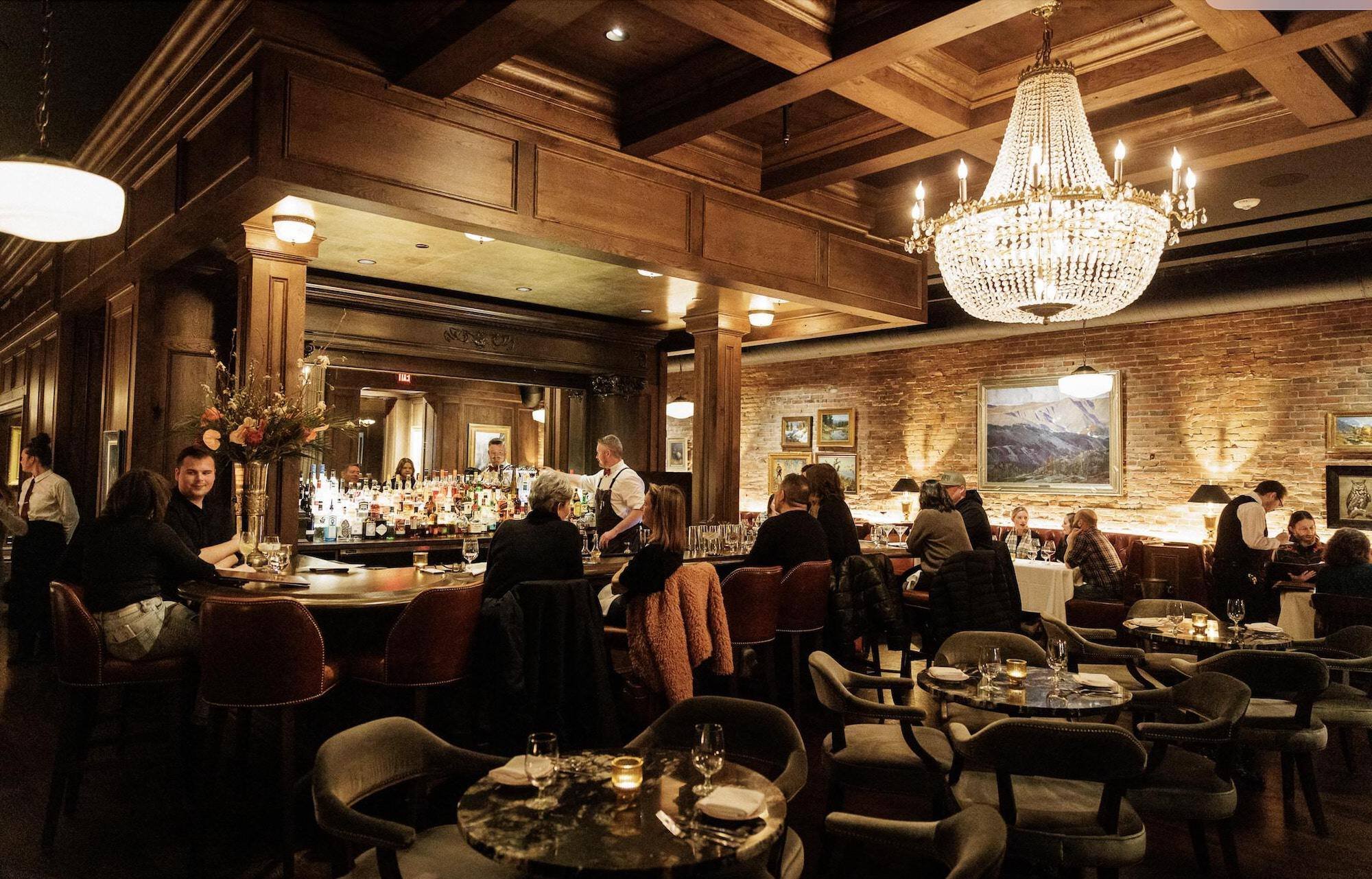 People dining inside J.W. Heist Steakhouse.