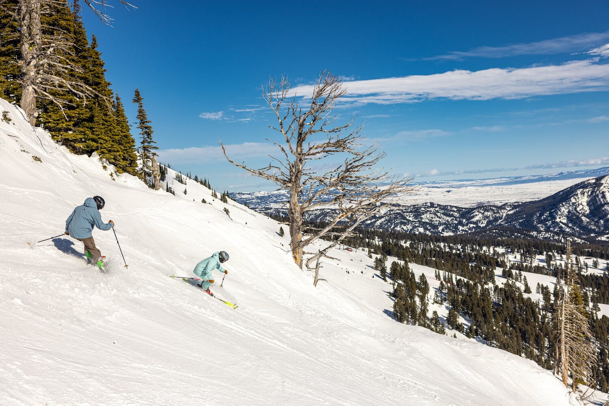 Two people skiing at Bridger Bowl.