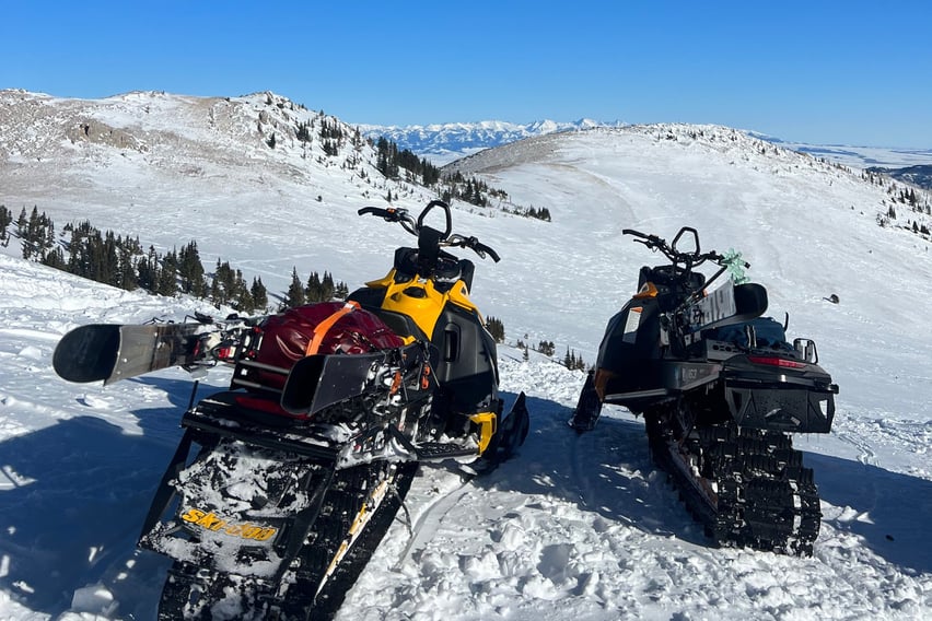 Two snowmobiles in the Bridger Mountains in Bozeman.