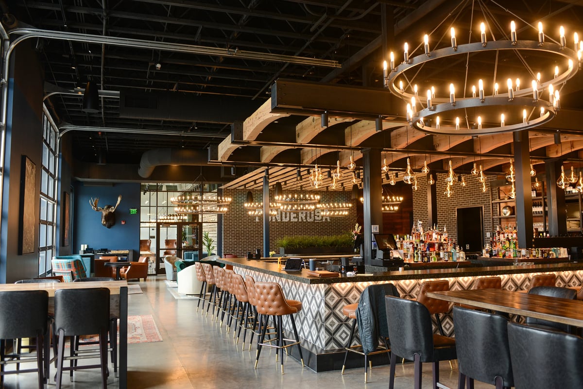 Bar and seating area at ponderosa social club in Bozeman