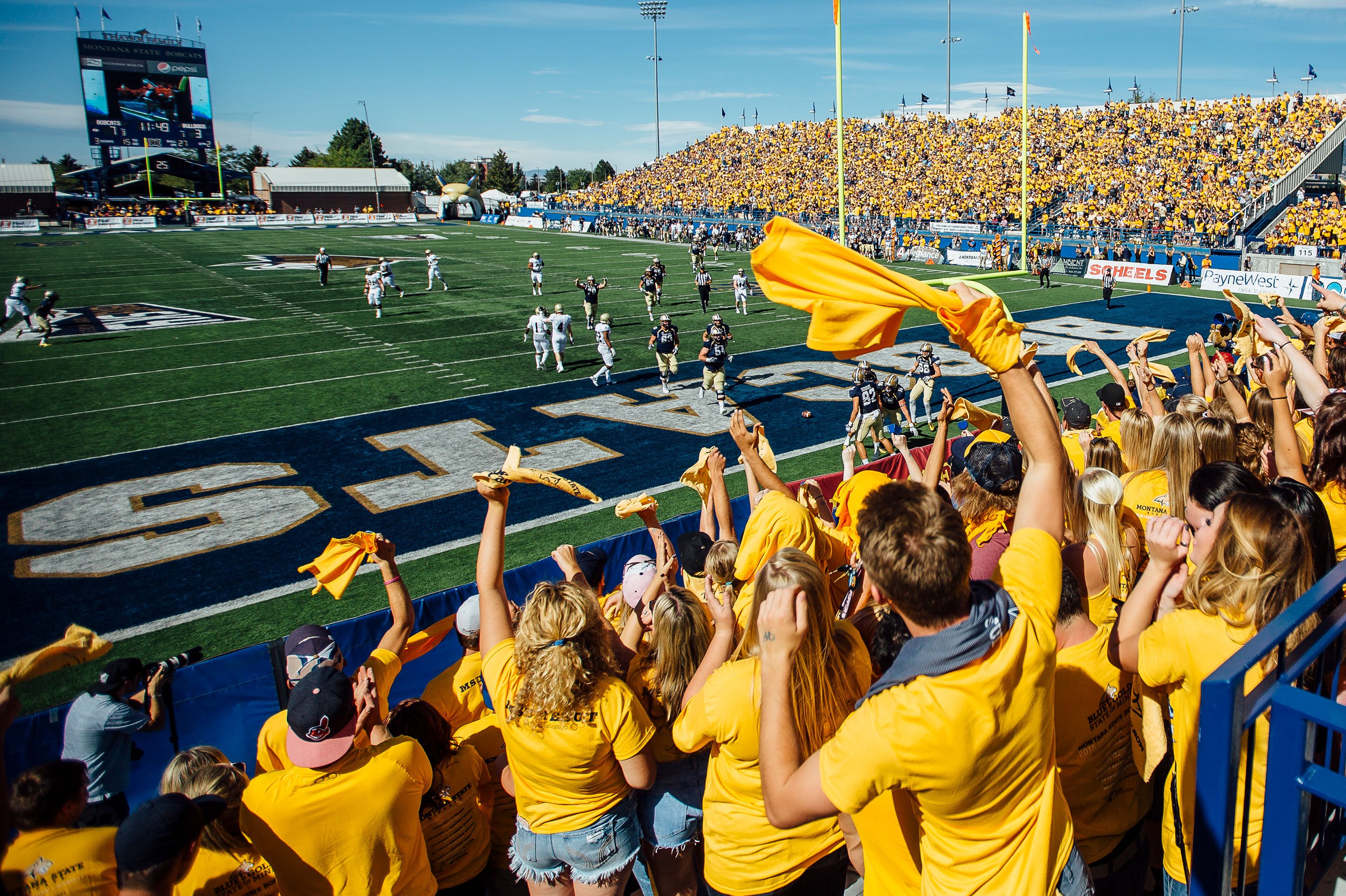 Photo of Bobcat football fans cheering on the team