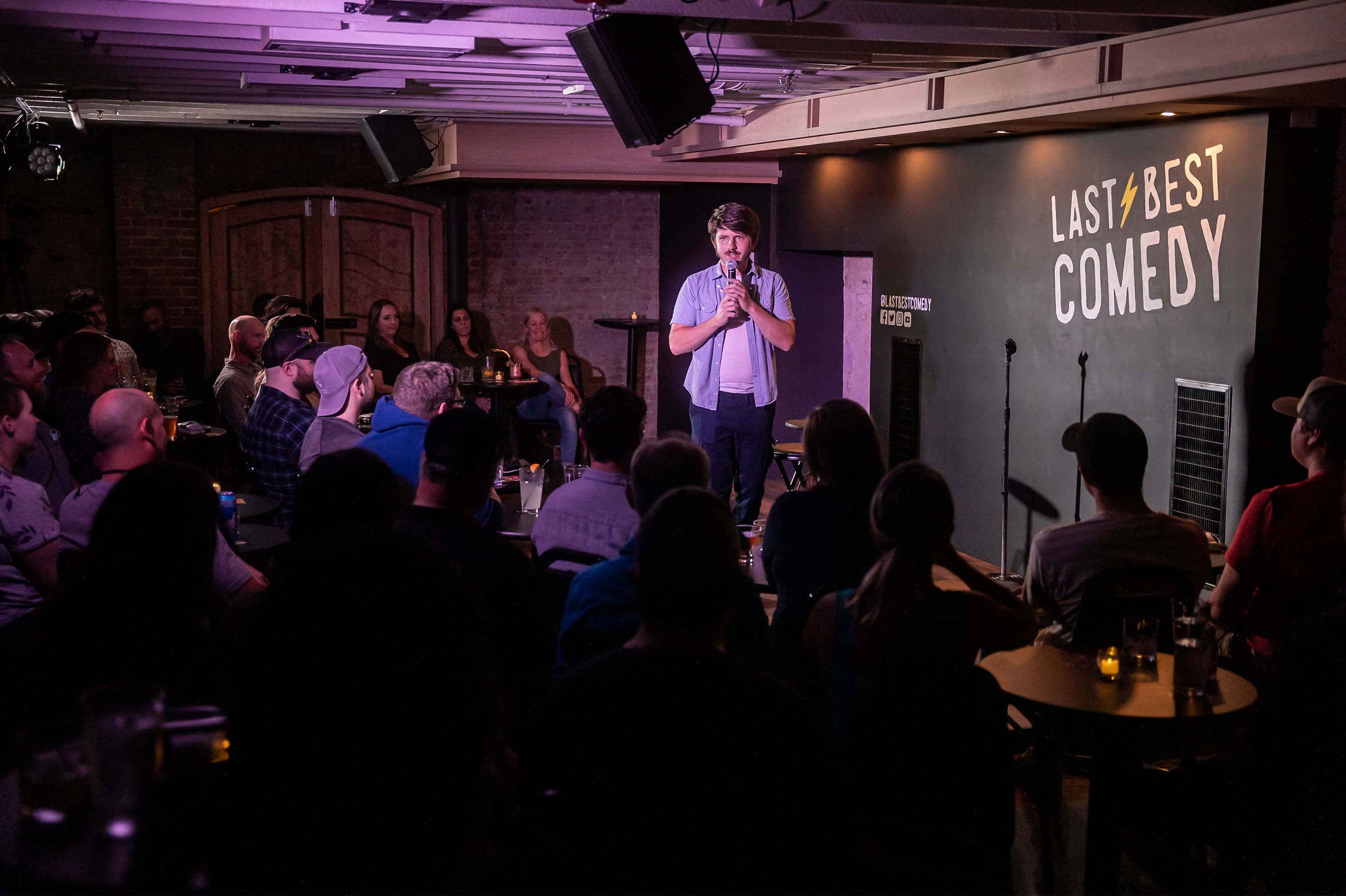man doing stand up at Last Best Comedy in Bozeman
