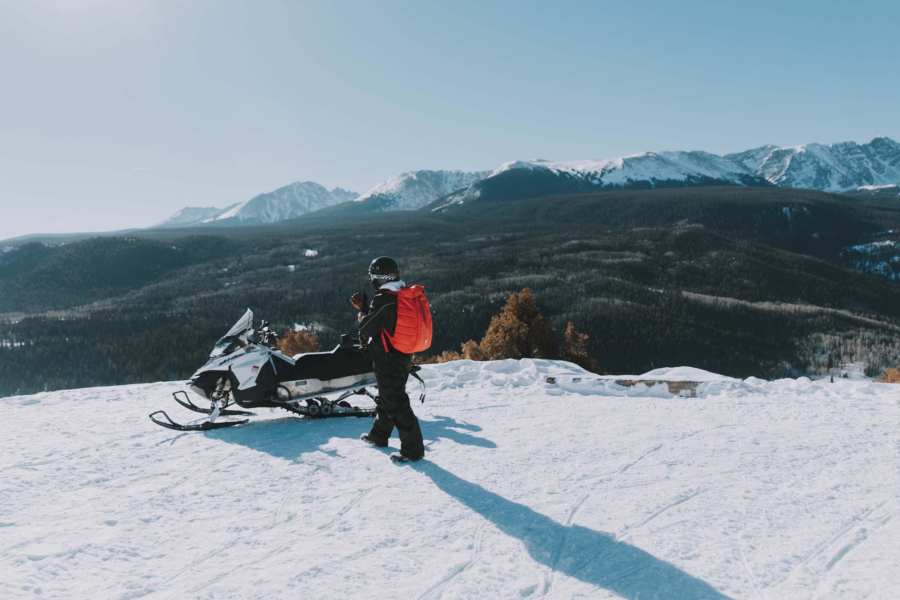 person snowmobiling in Bozeman, Montana