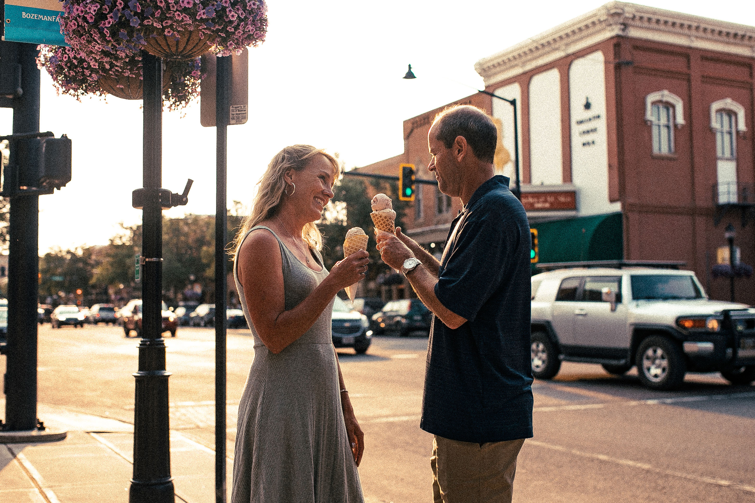 Photo of a middle aged couple enjoying ice cream in downtown Bozeman