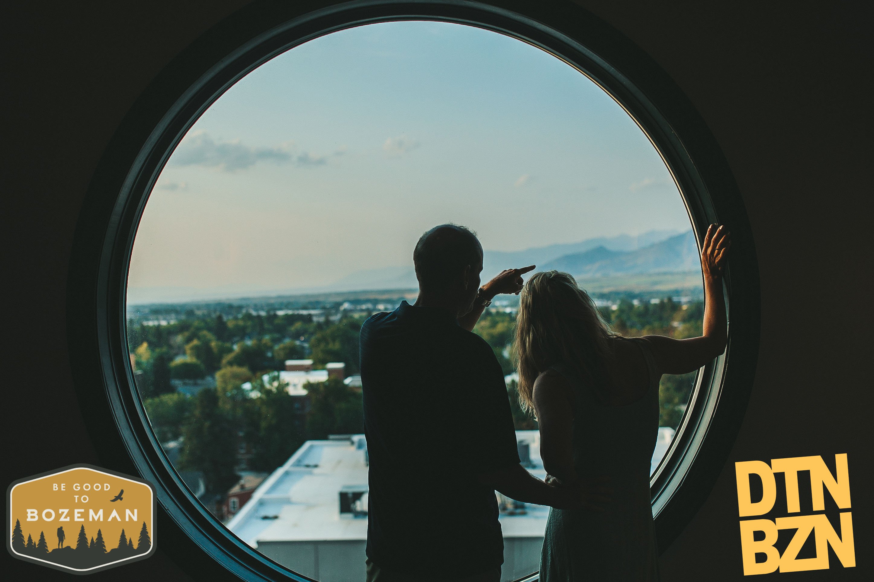 Image of a couuple looking out over Downtown Bozeman.
