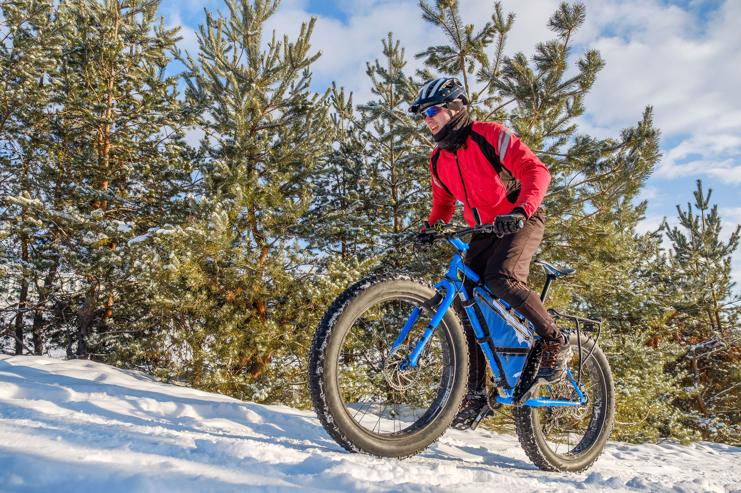 photo of a man fat tire biking