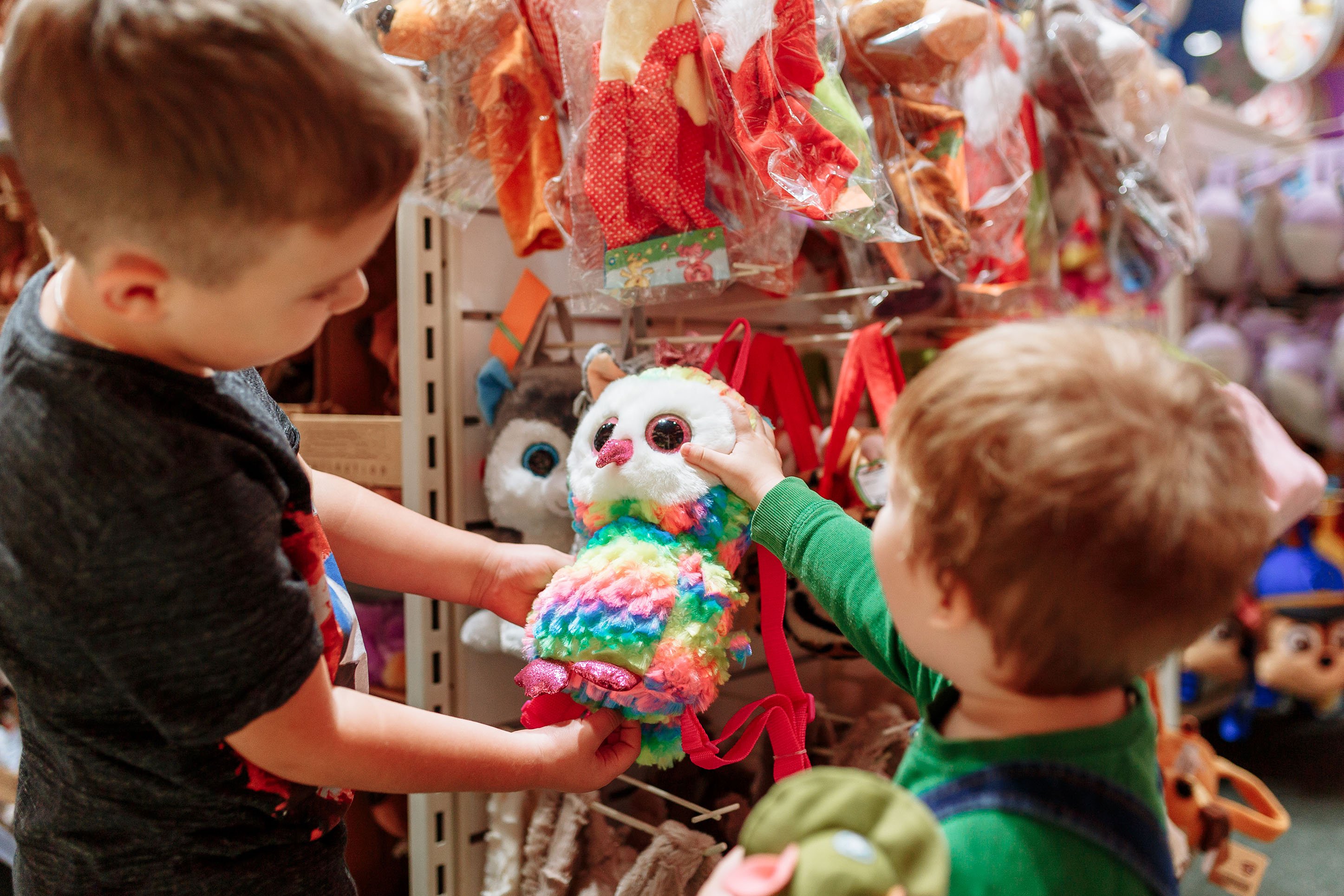 Two boys in a toy store. 