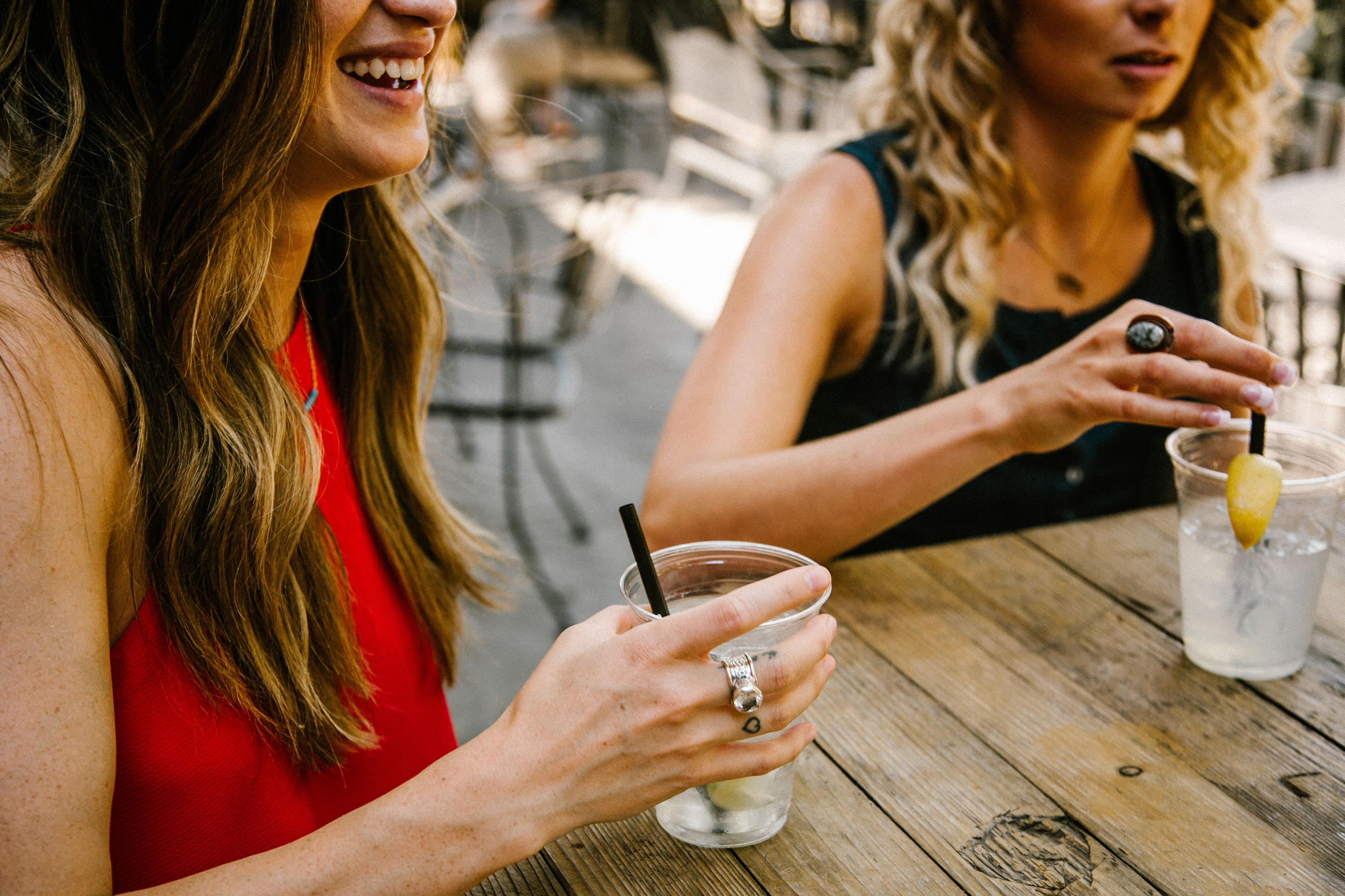 Image of girls at an outdoor bar with mocktails