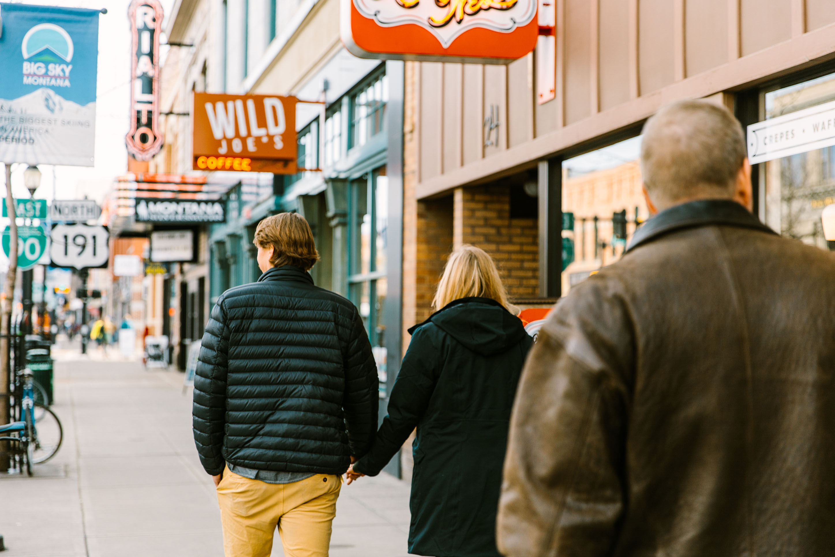 Couple walking dowtown Bozeman.