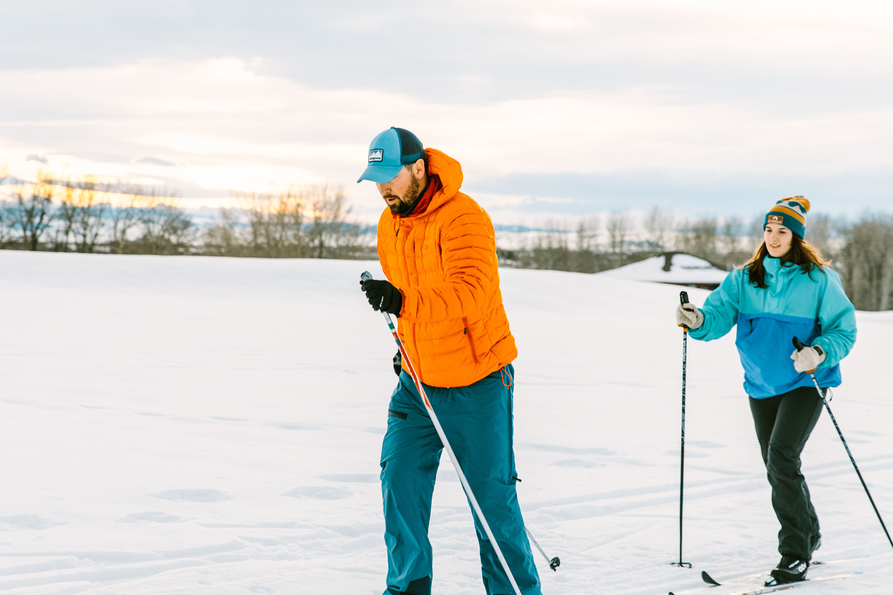 Man and woman nordic skiing in Bozeman