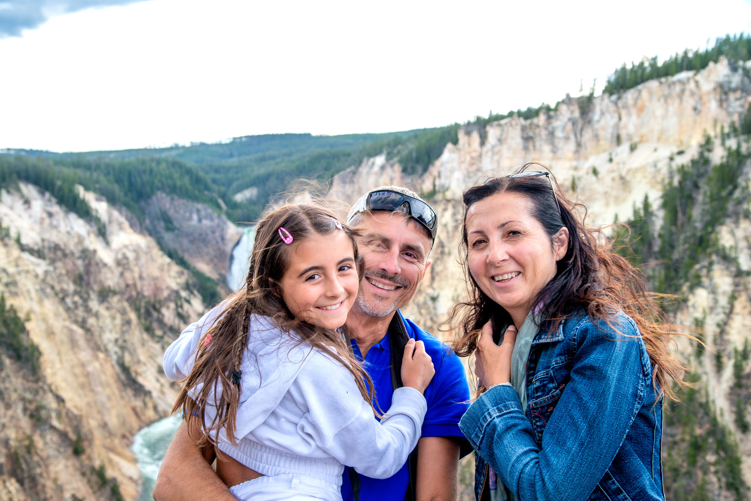 photo of a family at the Grand Canyon of Yellowstone