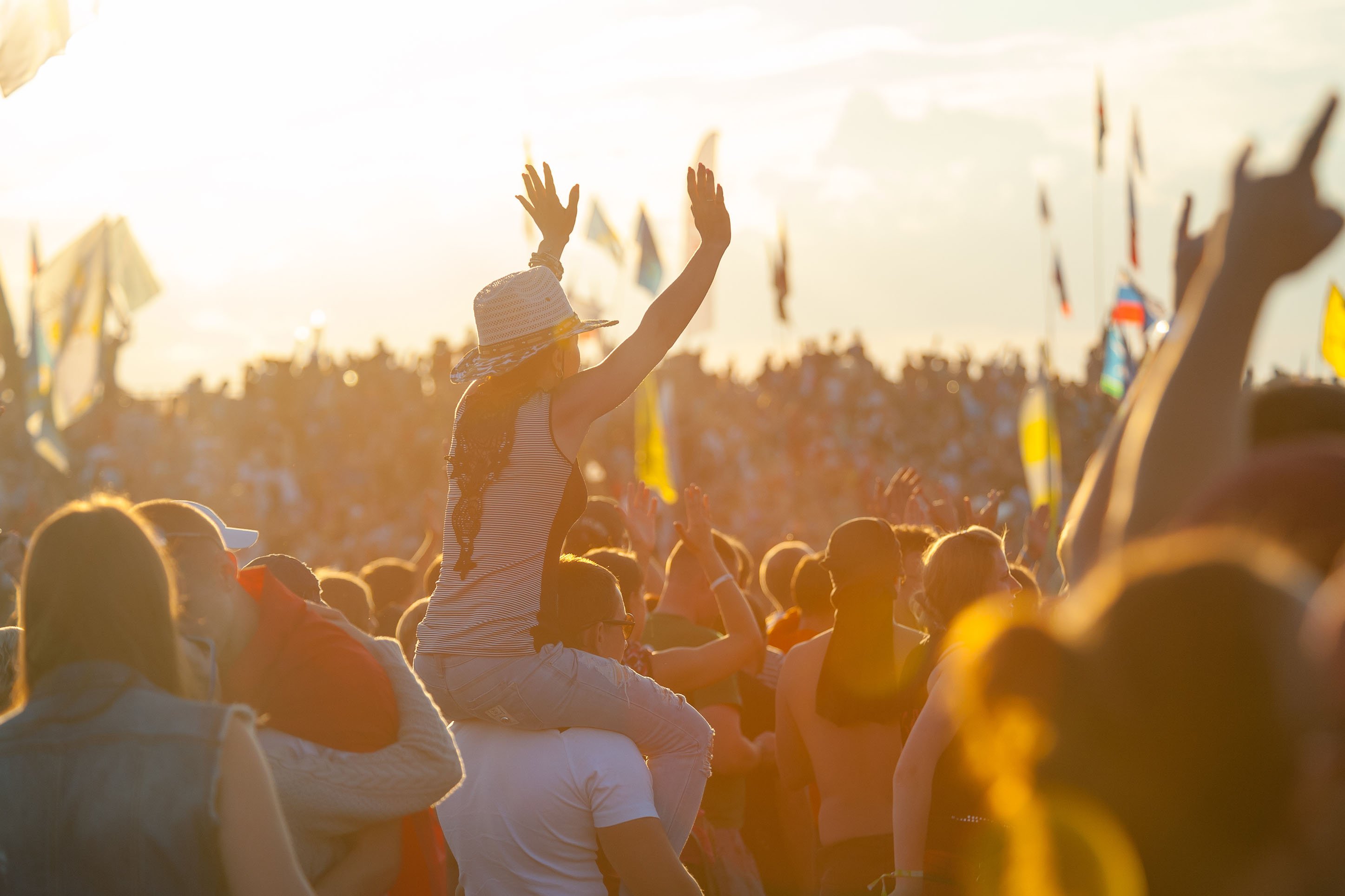Photo of a crowd at an outdoor music festival