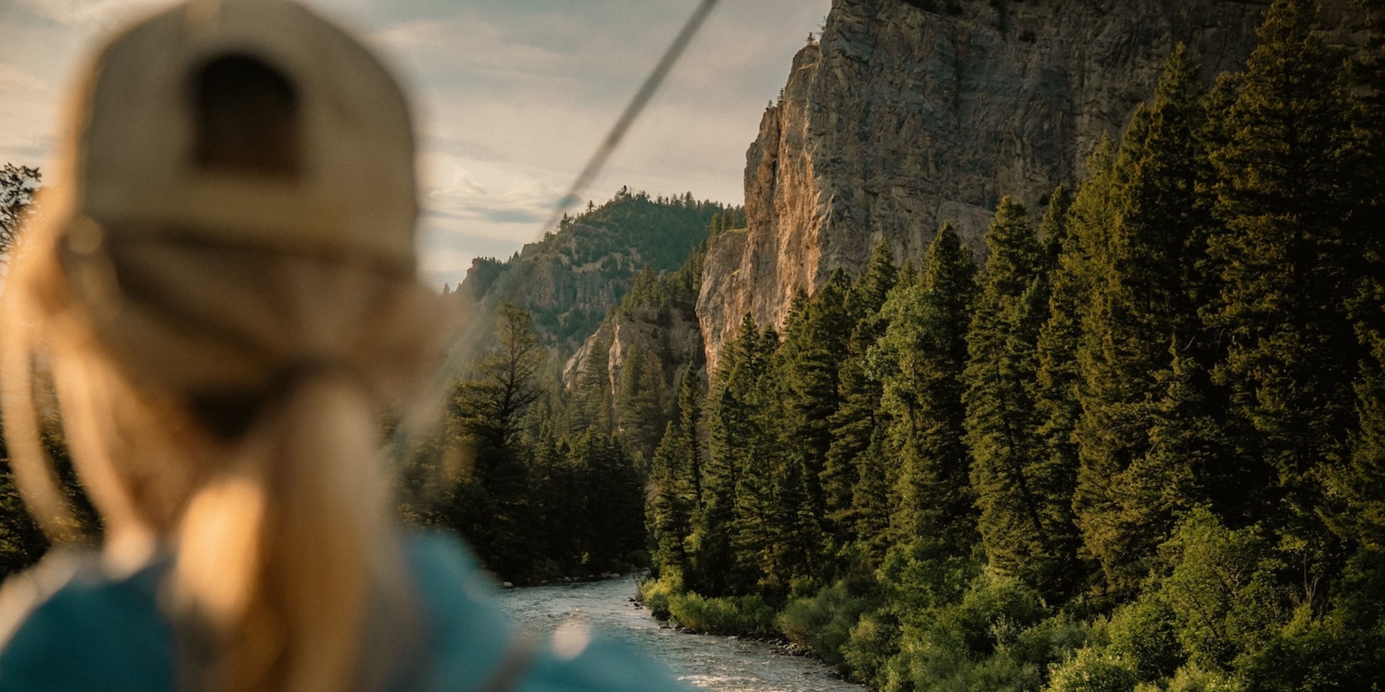 Woman looking at the Gallatin Canyon.