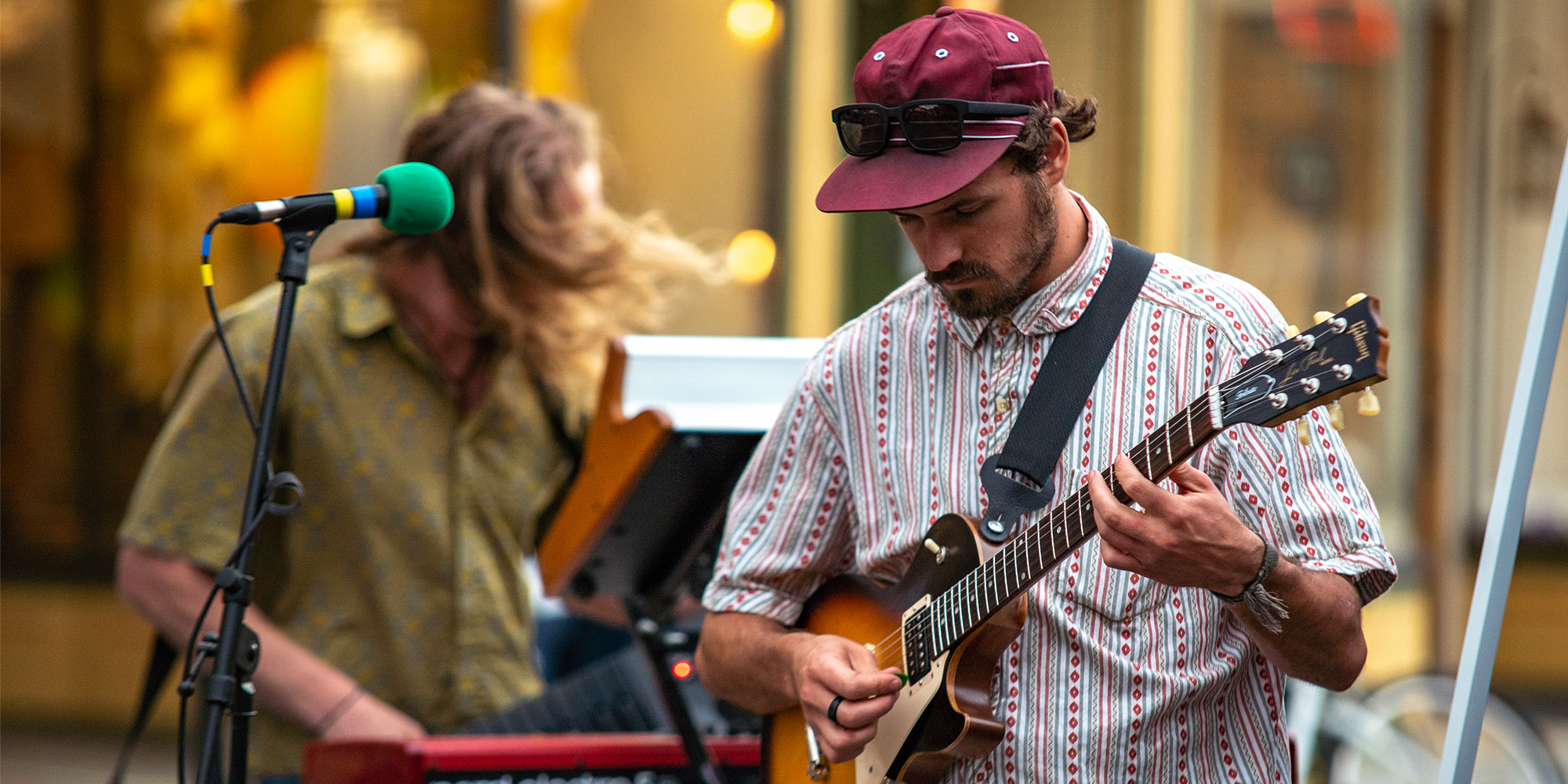 band member playing the guitar